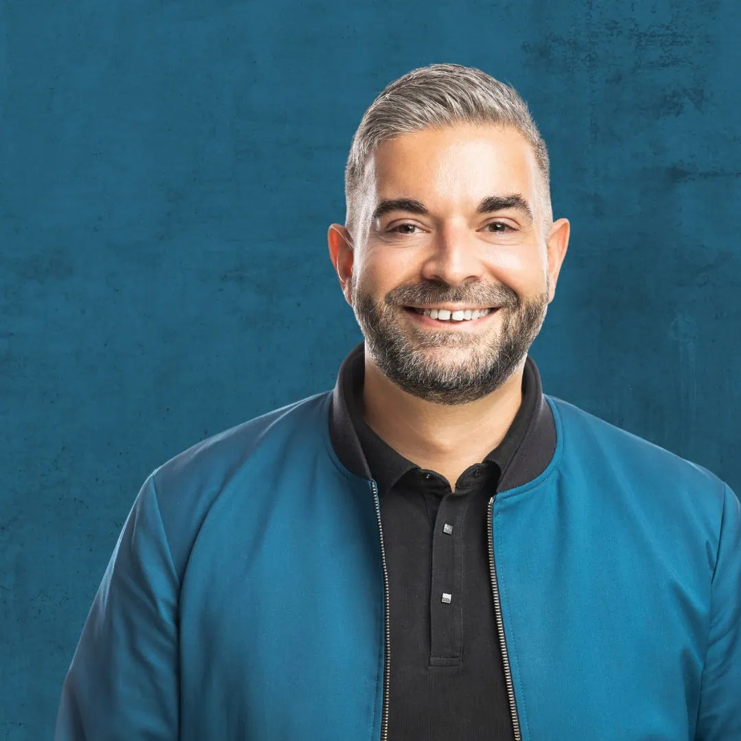 Ein Bild von Max, dem Geschäftsführer der ERFOLGSVISIONÄRE.